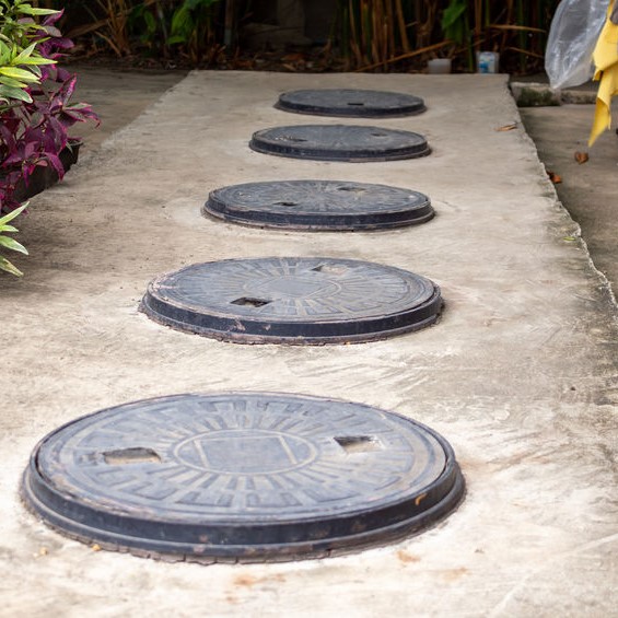 septic tank lids in a row