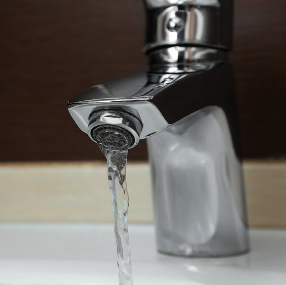 water from a slow faucet