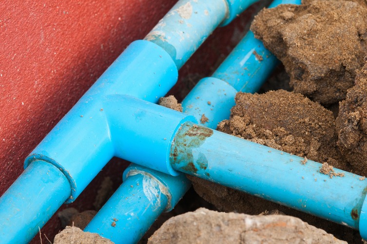 blue pipes in the ground